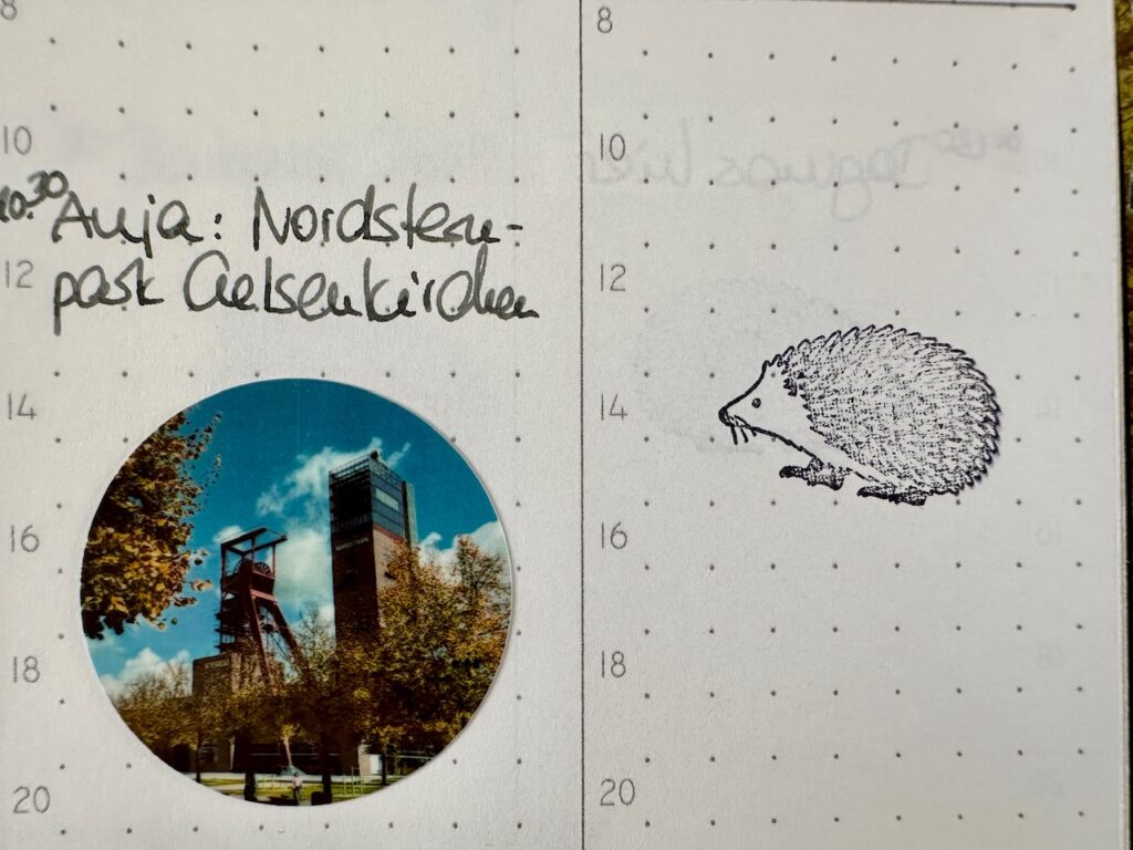 Blick in meinen Kalender mit Eintrag "Anja: Nordsternpark Gelsenkirchen" und darunter einem kleinen runden Fotosticker mit Foto vom Förderturm.